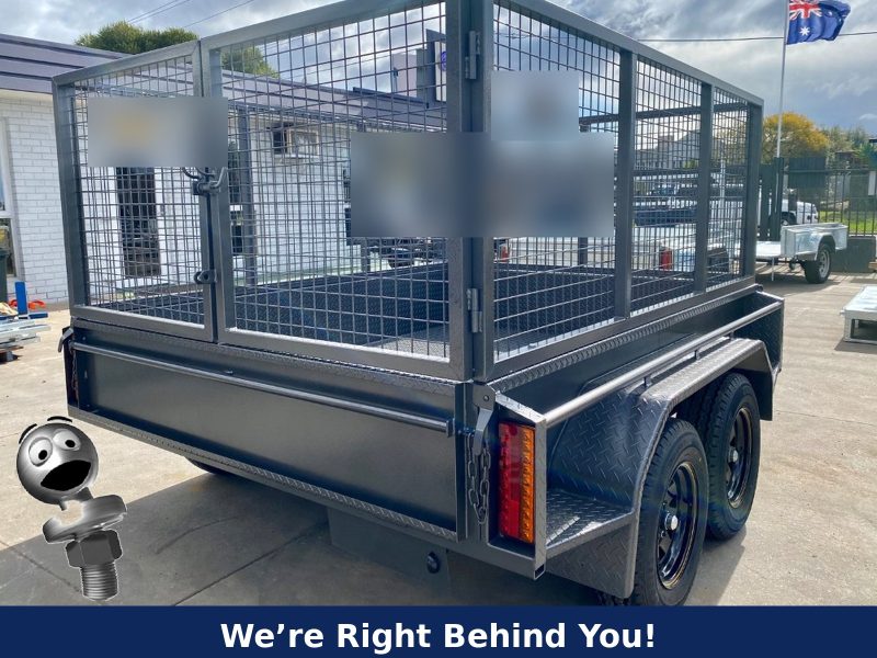 Tandem cage trailer with Toby the Towball – We're Right Behind You!
