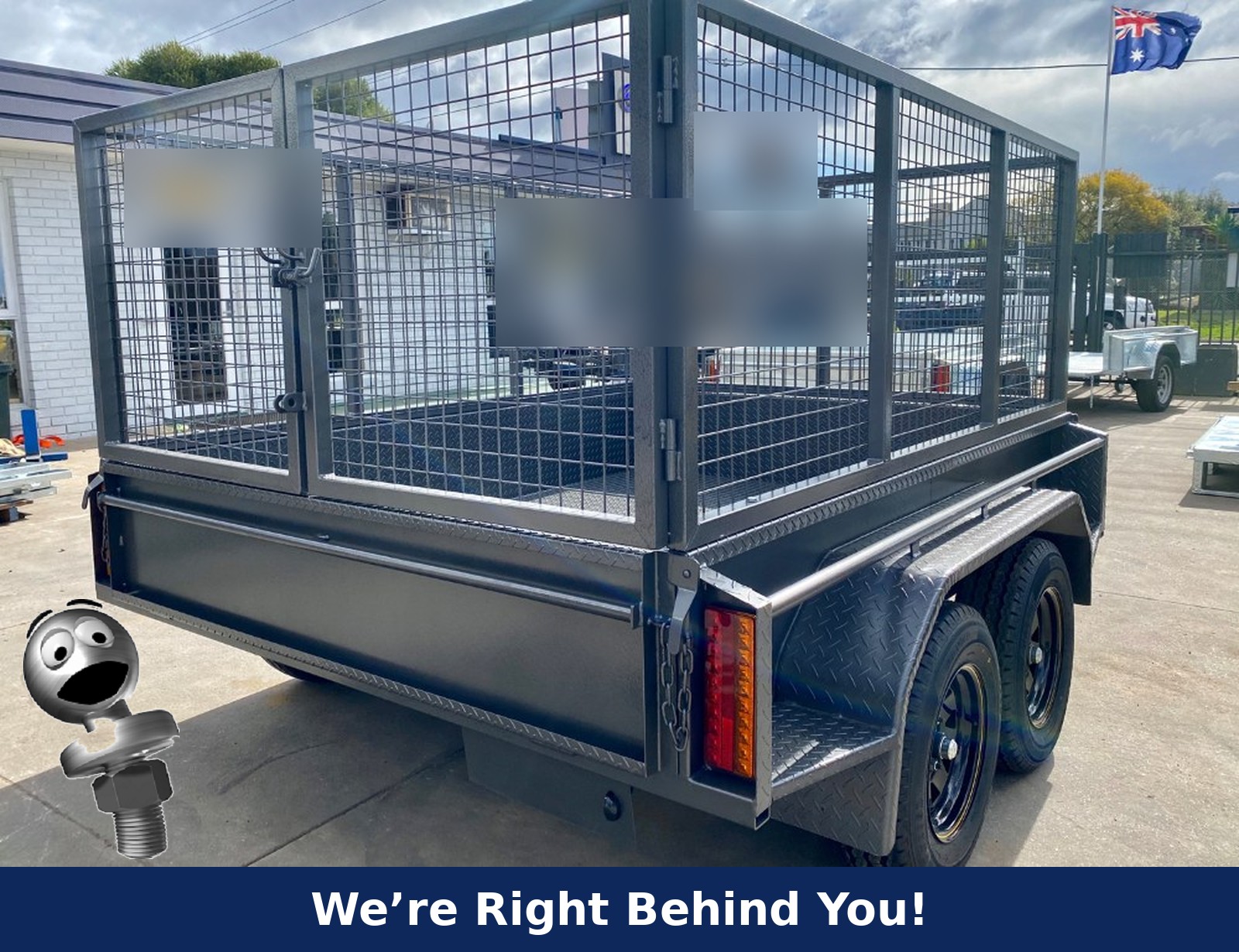 Tandem cage trailer with Toby the Towball – We're Right Behind You!